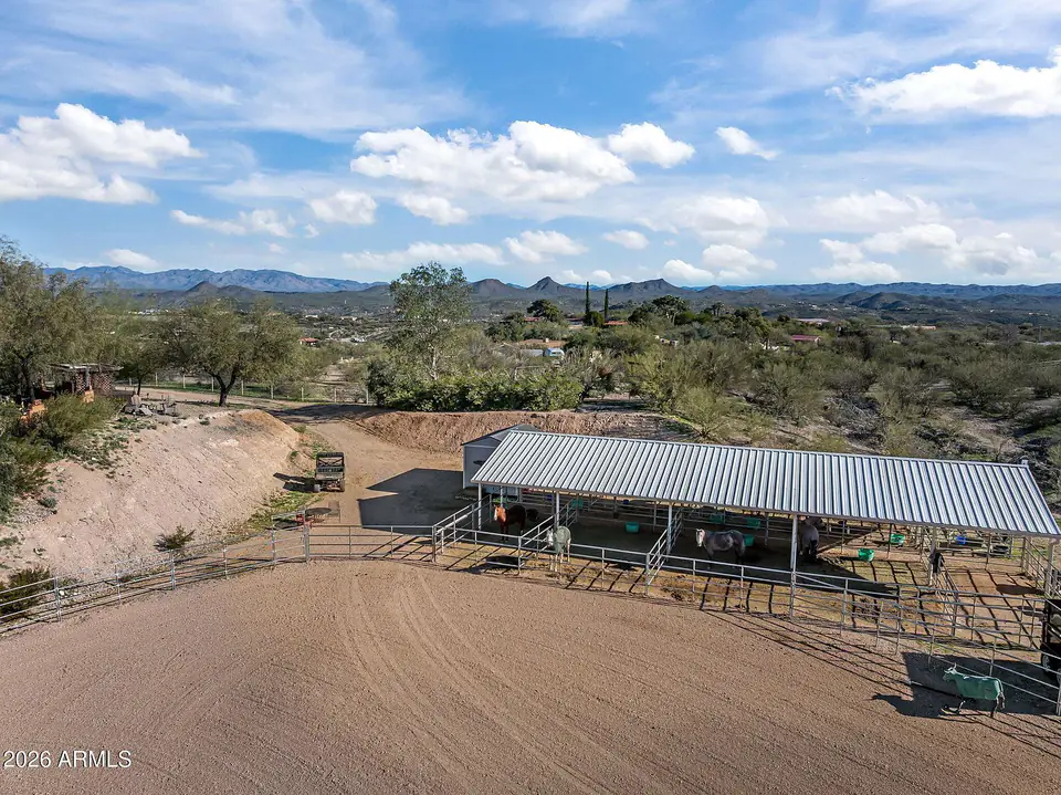 Aerial of the arena beside the long covered stall barn